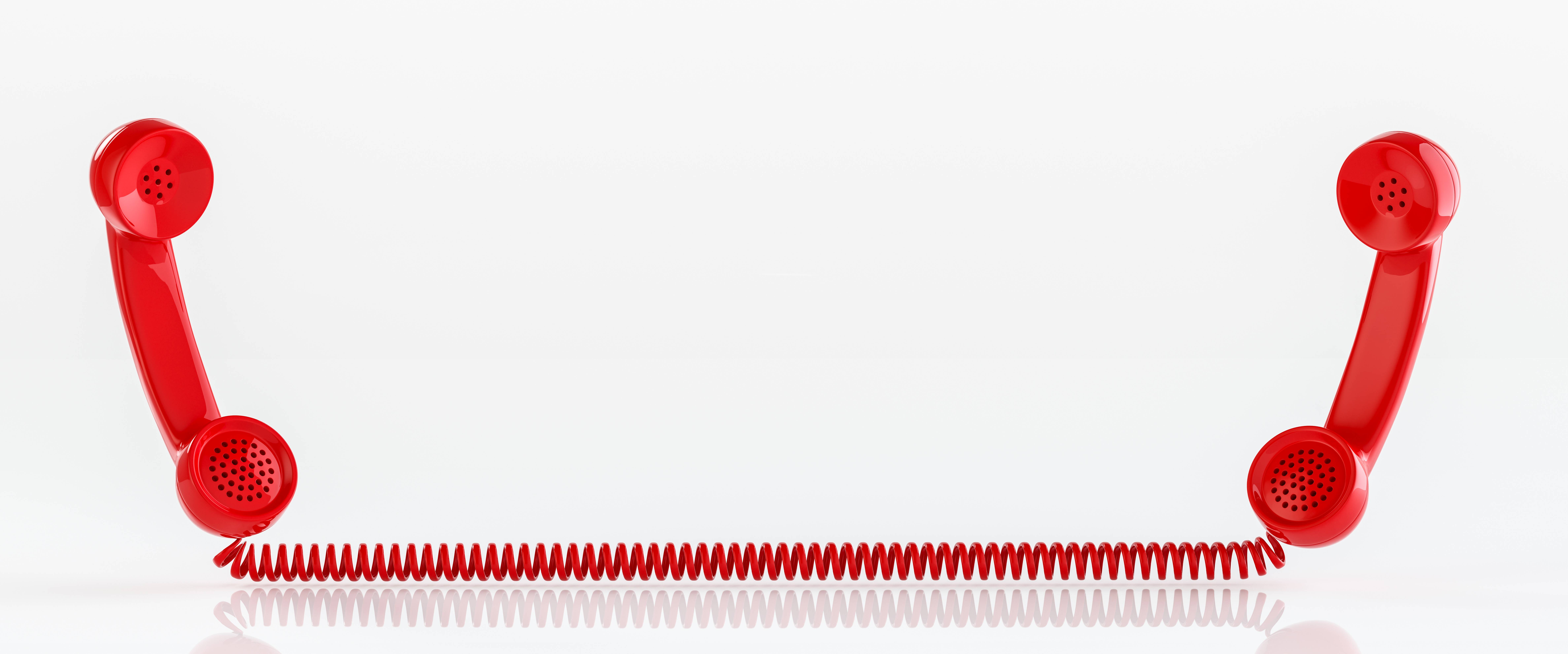 Two red emergency phones. Text saying need urgent help? 